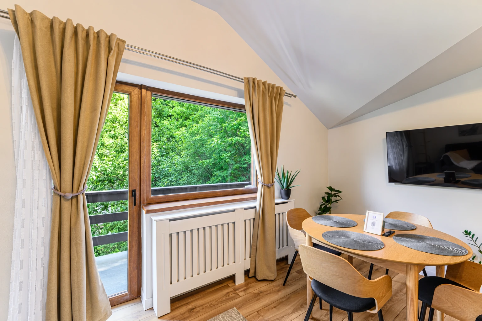 Table beside the balcony — Apartment 5